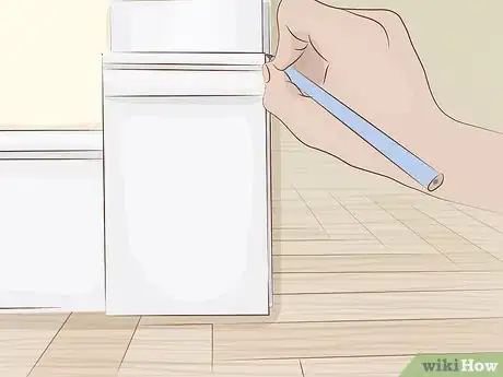 Image titled Install a Plinth Block at a Door Step 9