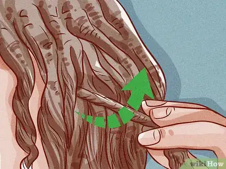 Image titled Do Finger Coils Step 8