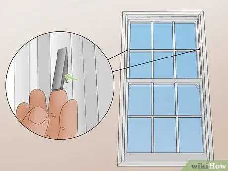 Image titled Remove a Vertical Sliding Window Step 3