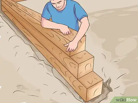 Image titled Build a Strong Retaining Wall with 4x4 Treated Post Step 11