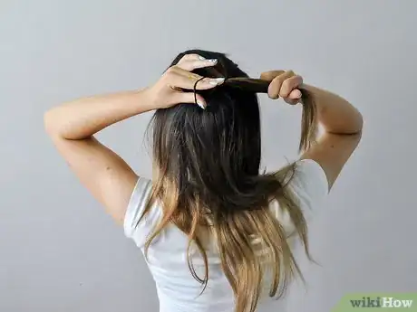 Image titled Do a Half Up Top Knot Step 3