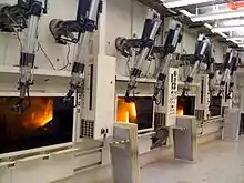 Image 7Most waste packaging, small-scale experimental fuel recycling chemistry and radiopharmaceutical refinement is conducted within remote-handled hot cells. (from Nuclear power)