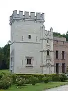 The Donjon Tower of Bouchout Castle, 20&nbsp;m (66&nbsp;ft) in height and strong walls 1&nbsp;m (3.3&nbsp;ft) thick. It was built c. 1300 by knight Daniel van Bouchout