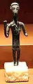 Chief with gammadion hilt daggers  on his chest, Fluminimaggiore, Antas