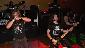 Cannabis Corpse performing at Jaxx Club (Springfield, Virginia), 2010. Left to right: Josh Hall, Andy Horn, Phil Hall