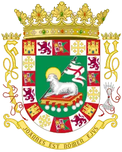 The Coat of arms of Puerto Rico features the Lamb of God and other symbols including the Kingdom of Jerusalem Cross and the Catholic Monarchs initials.