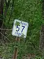 Pre-MUTCD standard route marker for CR&nbsp;57 in Dutchess County. Most of the county now uses the standard pentagon.