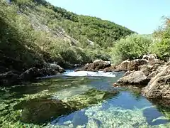 Unac leaving a canyon at Martin Brod outskirts.