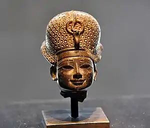 Thutmosis IV wearing the blue war crown of Egypt