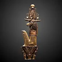 Amulet in the form of Heryshaf seated on a lotus; 1069–332 BC; gold; height: 11.5&nbsp;cm, width: 3.4&nbsp;cm; Louvre