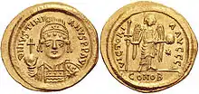 Coin of Justinian I of the type found in the tomb.
