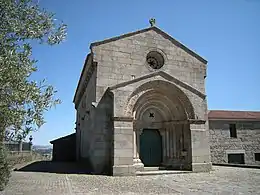 São Vicente de Sousa Church has a projected portal with a small front window.