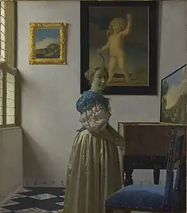 Johannes VermeerLady Standing at a Virginal
