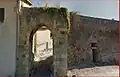 The rue des capots, and the "porte anglaise" in Mézin, Lot-et-Garonne. The rue des capots was formerly inhabited by the Capots (Cagots) of the town.