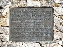 The plaque at Maclear's beacon at the highest point on Table Mountain (and the Cape Peninsula) at 1084&nbsp;m. It commemorates Maclear's recalculation of the curvature of the Earth in the Southern Hemisphere. In 1750, Abbé Nicolas Louis de Lacaille had measured the curvature of a meridian arc northwards from Cape Town, to determine the figure of the Earth, and found that the curvature of the Earth was less in southern latitudes than at corresponding northern ones (i.e. that the Earth was slightly pear-shaped, with the wider bulge south of the equator). However, when Sir George Everest visited the Cape in 1820 and inspected the site of La Caille's measurements in Cape Town, he suggested to Maclear that the gravitational effect of Table Mountain could have caused a miscalculation of the curvature of the meridian. This was based on Everest's experience in the Himalayas. Taking this factor into account Maclear established the curvature of the Southern Hemisphere was in fact the same as that of the Northern Hemisphere.