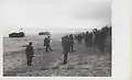 Marines of the 26th Marines wait for the word to deploy after coming ashore