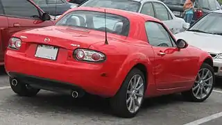 Mazda Miata Power Retractable Hard Top (PRHT) c. 2007, with 77&nbsp;lb (35&nbsp;kg) polycarbonate hardtop and identical cargo capacity to the soft top version