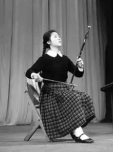 Min Huifen playing the erhu, c. 1963