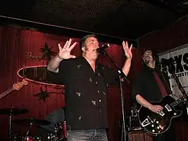 Mojo Nixon (left) at Continental Club in Austin, Texas. Photo – Ron Baker (2006).