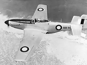 Overhead shot of single-engined fighter aircraft in flight