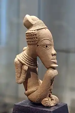 Image 6Nok seated figure; 5th century BC – 5th century AD; terracotta; 38&nbsp;cm (1&nbsp;ft. 3 in.); Musée du quai Branly (Paris). In this Nok work, the head is dramatically larger than the body supoorting it, yet the figure possesses elegant details and a powerful focus. The neat protrusion from the chin represents a beard. Necklaces from a cone around the neck and keep the focus on the face.