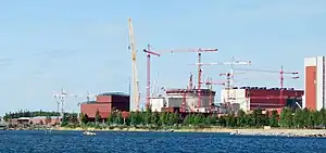 Image 69Olkiluoto 3 under construction in 2009. It was the first EPR, a modernized PWR design, to start construction.  (from Nuclear power)