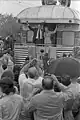 President Gerald Ford (Republican) and his wife Betty wave from a train during their whistle-stop tour of Michigan during his campaign in the Republican primaries of the 1976 presidential election
