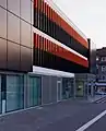 Artinstallation at the outside facade of the headquarter of the Sparkasse Gütersloh–Rietberg, Gütersloh, Fluorescent acrylic glass, 2010, 86 Elements each 120 × 5 × 50&nbsp;cm, side view