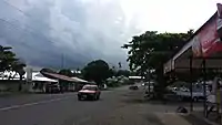 Road flanked with shops.