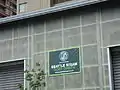 Sign on wood handling building on Western Avenue