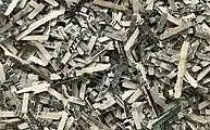 Shreds of unfit US dollar notes with a typical size of less than 1.5&nbsp;mm × 16&nbsp;mm