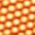 Atoms on the surface of a crystal of silicon carbide (SiC) are arranged in a hexagonal lattice and are 0.3&nbsp;nm apart.