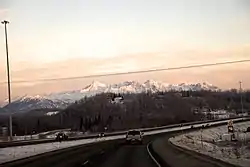 Southbound George Parks Highway approaching the interchange with Fairview Loop Road and Hyer Road. The CDP's southern edge, where it borders with the Gateway CDP, is seen at left.