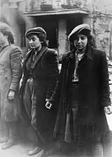 IPN copy #26Hehalutz women captured with weapons.Małka Zdrojewicz on the right of this photograph survived Majdanek; the other two died in the Shoah (Rachela Wyszogrodzka at left died in KZ Camp; her sister Bluma Wyszogrodzka was shot and killed after this picture was taken)