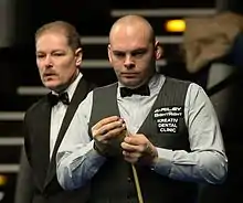 Picture of Bingham next to a referee