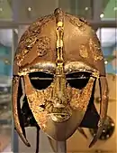 The helmet of Sutton Hoo; early 7th century AD; coppery alloy, iron, gold and garnet; height: 31.8&nbsp;cm; British Museum
