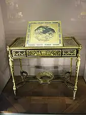 Writing table of Marie-Antoinette; by Adam Weisweiler; 1784; oak, ebony and sycamore veneer, Japanese lacquer, steel, bronze gilt; 73.7 x 81. 2&nbsp;cm; Louvre