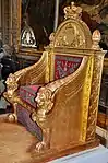 Throne; by Bernard Poyet and François-Honoré-Georges Jacob-Desmalter; 1805; carved and gilded wood, covered in red velvet with silver embroidery; 160 x 110 x 82&nbsp;cm; Musée des Arts Décoratifs (Paris)