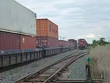 Passing sidings in North America can be very long. This one in Bolton, Ontario&nbsp;– the track on the right&nbsp;– measures some 3.5&nbsp;km (2.2&nbsp;mi).