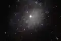 NGC 4707 is a spiral galaxy roughly 22 million light-years from Earth.