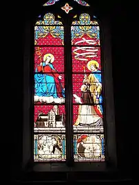 Vitrail de l'abbé Taury offrant l'église Notre-Dame au Christ.