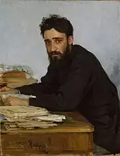 Portrait d'un homme de profil, regardant de face, le visage doux et triste.