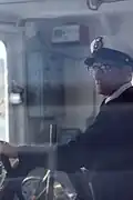 Capitaine dans sa cabine, sur le traversier