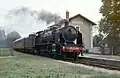 La 141 C 100 en gare de Champigny-sur-Veude le 28/08/1983.