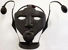 Masque de honte au Märkisches Museum Berlin, Allemagne, XVIIIe siècle.