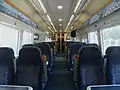 L'aménagement en classe standard d'une rame Class 375 Electrostar Southeastern, montrant l'habillage des sièges de couleur grise.