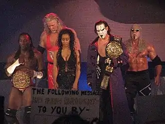 Kevin Nash avec The Main Event Mafia.