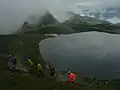 Plan d'eau entre le télèsiège de Quilis (2 363 m) et la roche de Mio (2 681 m)