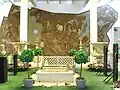 Jardin de Mahdia avec à l'arrière-plan une mosaïque de Néréides provenant de Carthage.