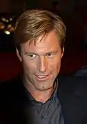 Aaron Eckhart (Procureur Harvey Dent / Double-Face)